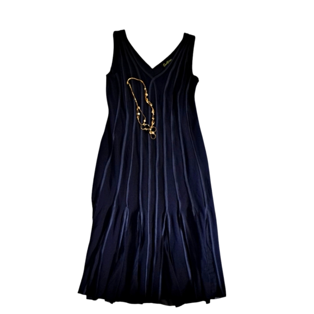 Black Embellished Pleated Midi Dress With sheer hem detailing. 👗👚